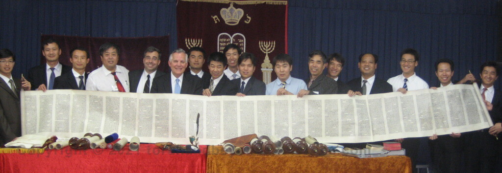 Chinese Pastors holding the Scroll of Isaiah
