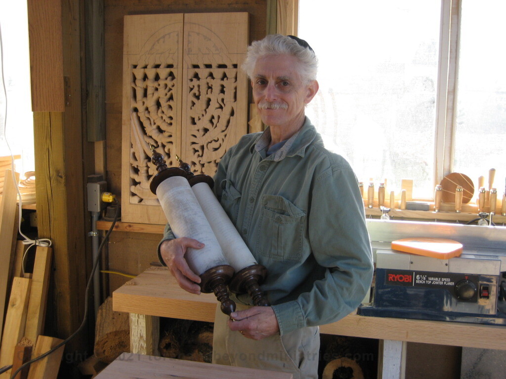 Authentic Scroll of Psalms written in Israel. Dan Katz a master woodcarver made the Etz Chaim for the Scroll. 