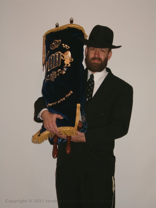 Hebrew Scroll seminar Wisconsin Guest holding Torah Scroll