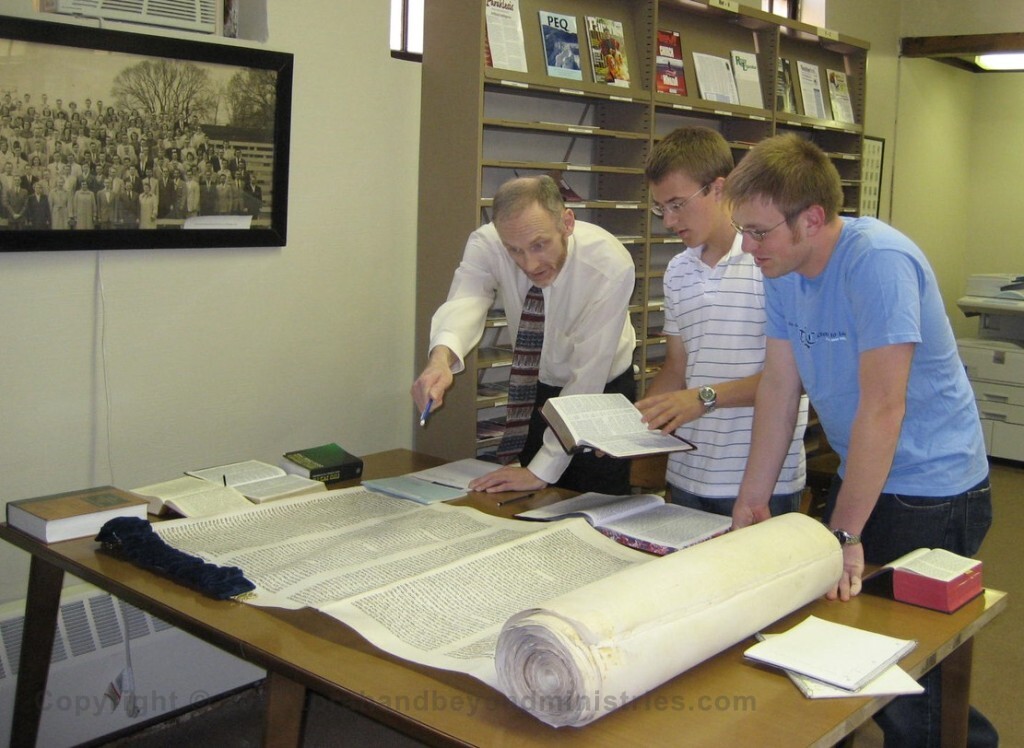 Hebrew Professor teaches from our Torah Scroll