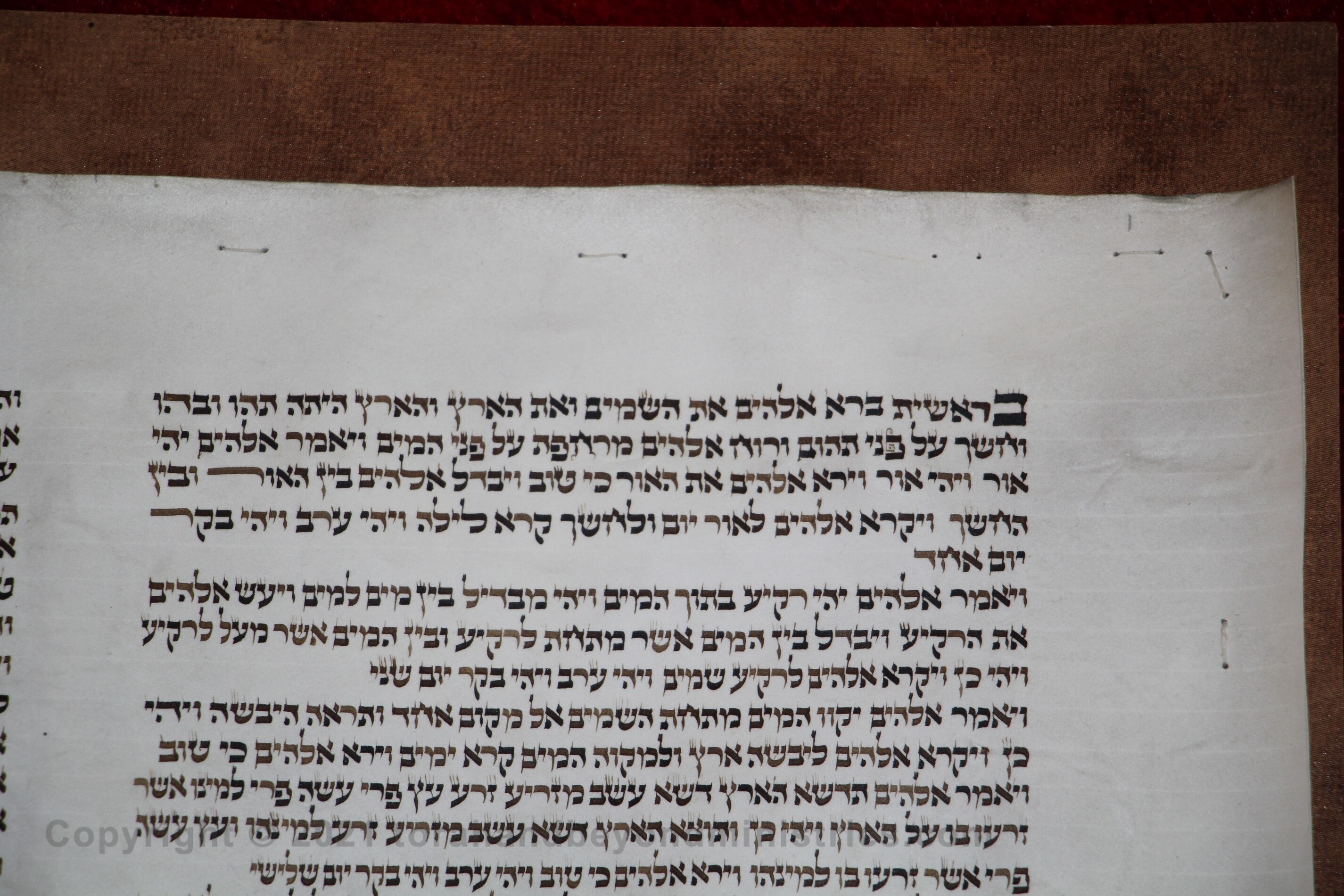 The Creation as photographed from a very old Torah Scroll which was re-lettered